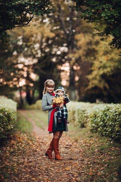 Beautiful caucasian mother with braid embracing her daughter