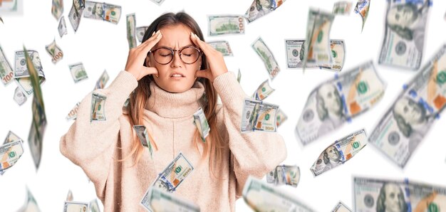 Beautiful caucasian woman wearing wool winter sweater suffering from headache desperate and stressed because pain and migraine. hands on head.