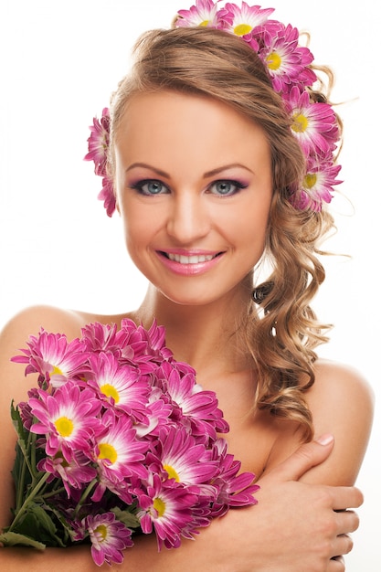 Beautiful caucasian woman with fresh flowers