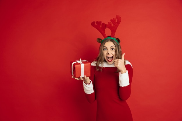 Free Photo beautiful caucasian woman with long hair like santa's reindeer