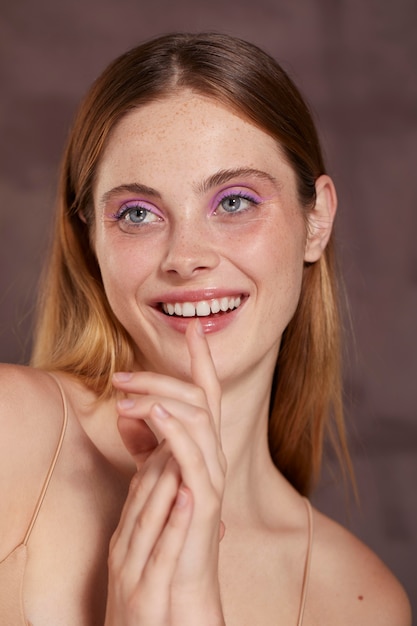 Beautiful caucasian woman with pink eyeliner