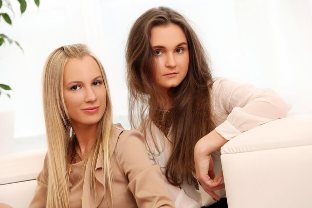 Beautiful caucasian women posing at home 