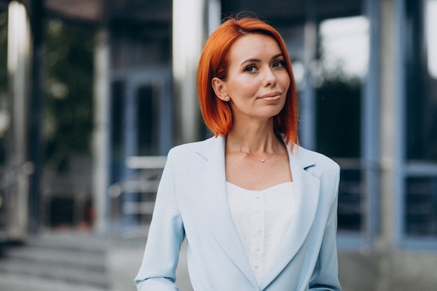 Beautiful classy woman in a blue suit