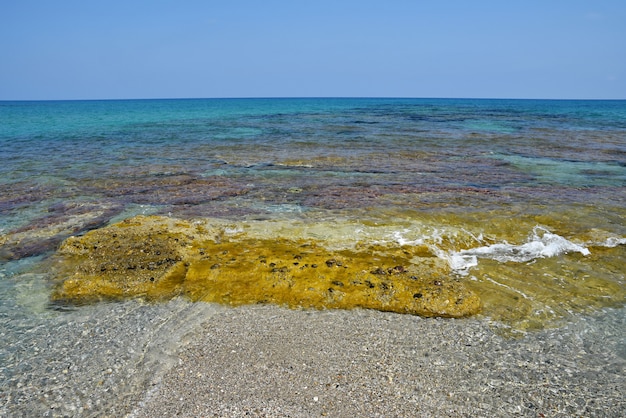 Beautiful clean sea and waves. Summer background for travel and holidays. Greece Crete.. Amazing sce