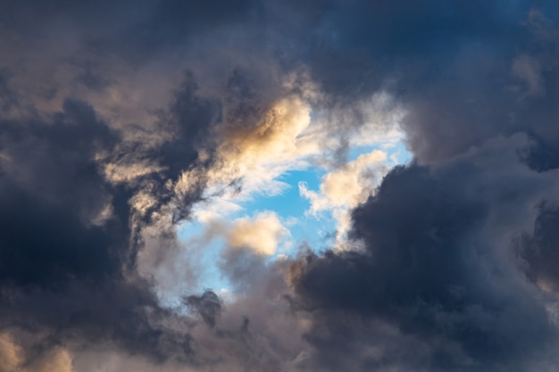 Free Photo beautiful cloudscape at sunset after rain