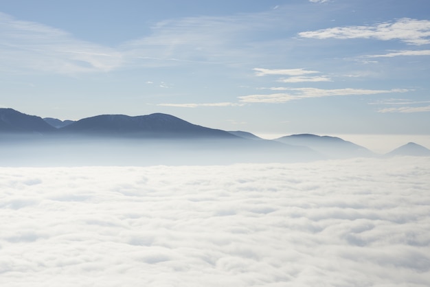 Beautiful cloudscape Below Swiss Alps in Ticino, Switzerland.