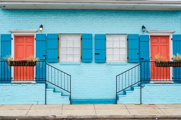 Free Photo beautiful color scheme of staircases leading to apartments with similar doors and windows