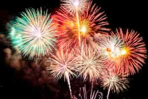 Free photo beautiful colorful firework display at night for celebrate