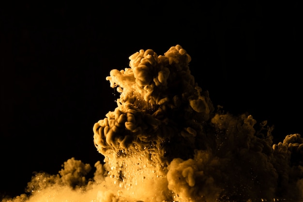 Beautiful composition with yellow clouds on black background