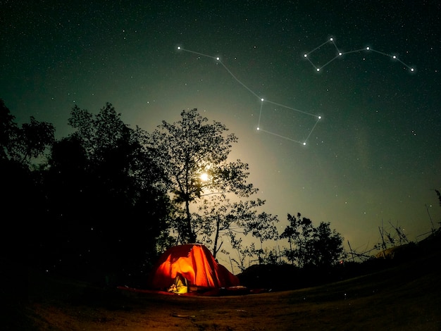 Free photo beautiful constellations and tent in nature