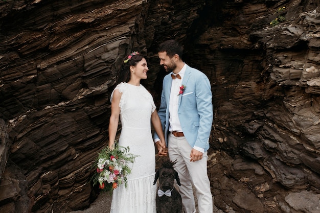 Beautiful couple having their wedding on the beach