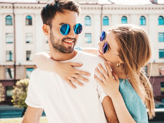 Beautiful couple posing at the street