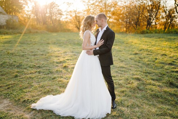 Beautiful couple posing on their wedding day