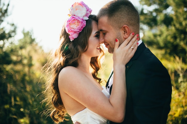 Beautiful couple posing on their wedding day