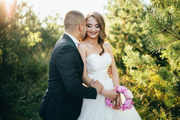 Beautiful couple posing on their wedding day