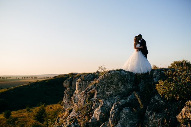 Beautiful couple posing on their wedding day