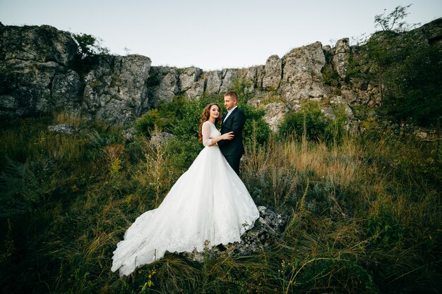 Beautiful couple posing on their wedding day