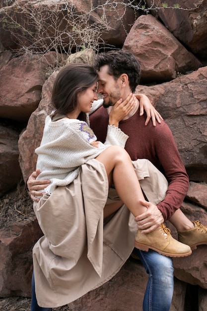 Beautiful couple showing love to each other outdoors