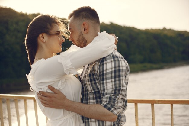 Beautiful couple spend time by the water