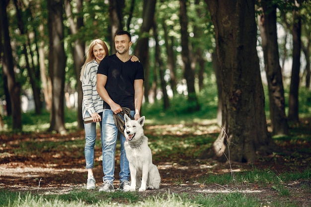 Beautiful couple spend time on a forest