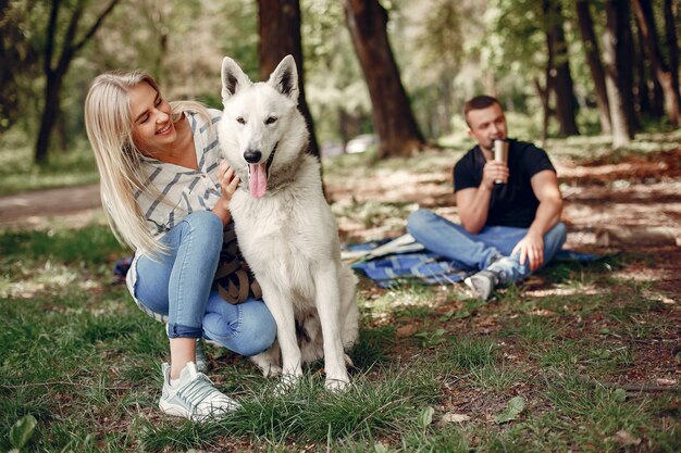 Beautiful couple spend time on a forest