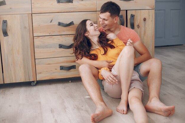 Beautiful couple spend time in a kitchen