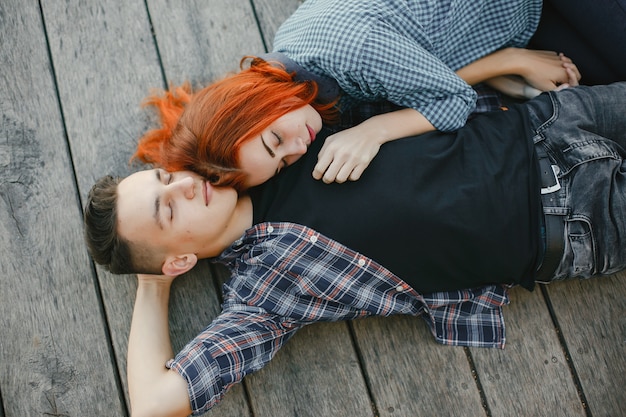 Beautiful couple spend time near a water