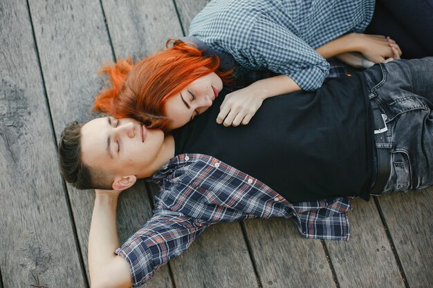 Beautiful couple spend time near a water