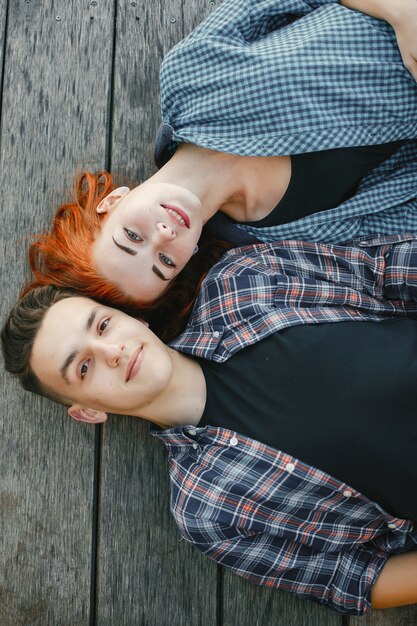 Beautiful couple spend time near a water