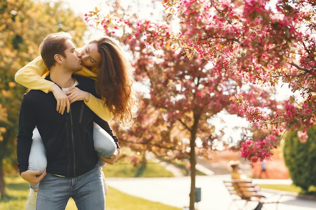 Beautiful couple spend time in a spring park