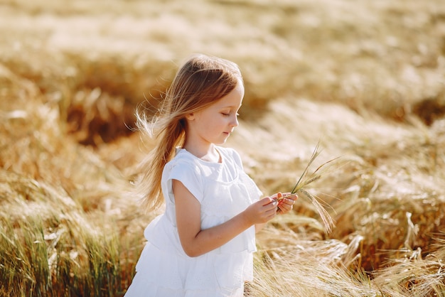 Beautiful couple spend time on a summer field