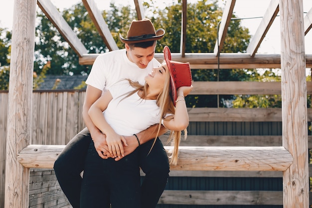 Beautiful couple spend time in a summer park