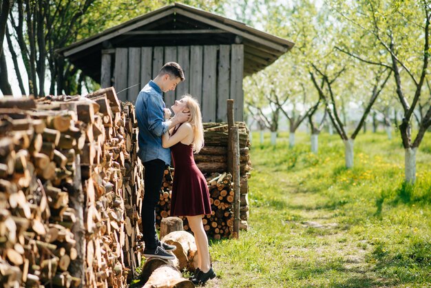 Beautiful couple spend time in a summer park