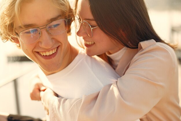 Beautiful couple spend time on a summer park