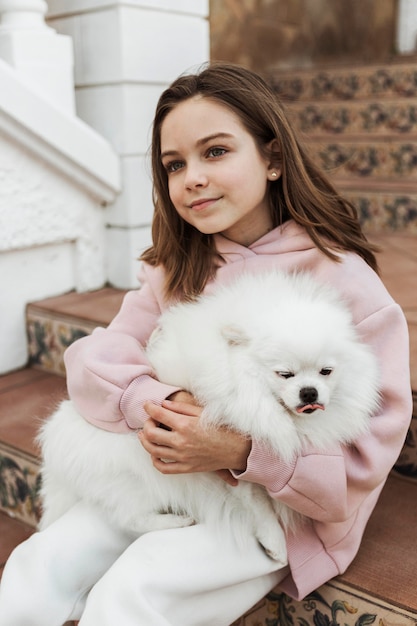 Free photo beautiful cute girl and her companion