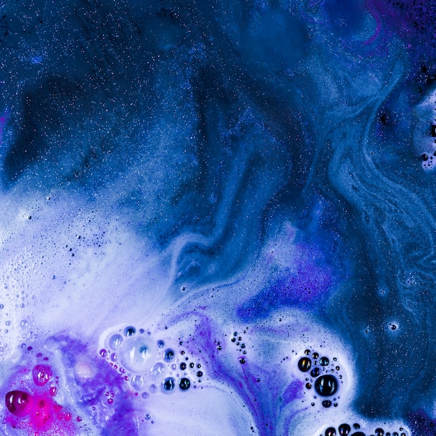 Free Photo beautiful dark blue liquid with light foam