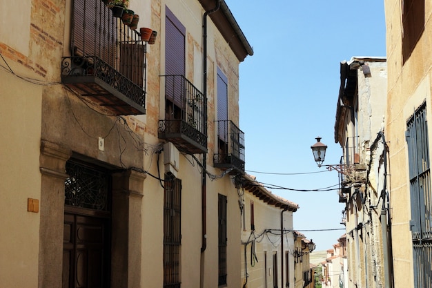 Beautiful daytime picture of a narrow street and short buildings