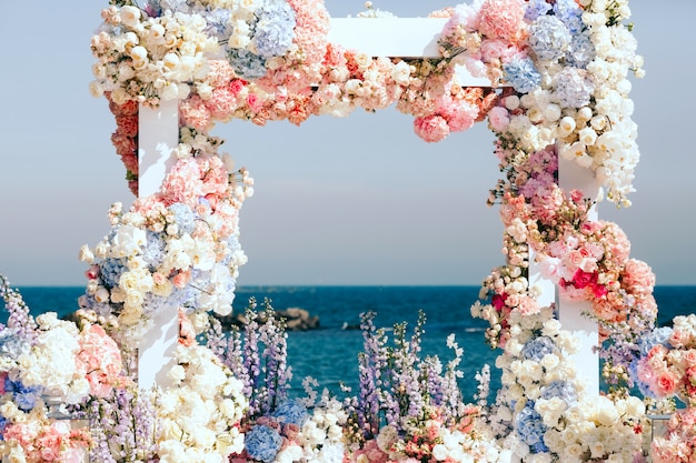 Free Photo beautiful decorated wedding arch near the sea