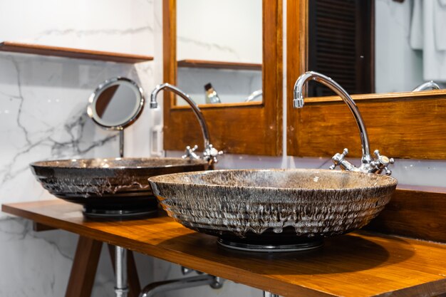 Beautiful decoration interior of sink and water faucet in bathroom