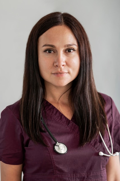 Beautiful doctor in uniform at the hospital