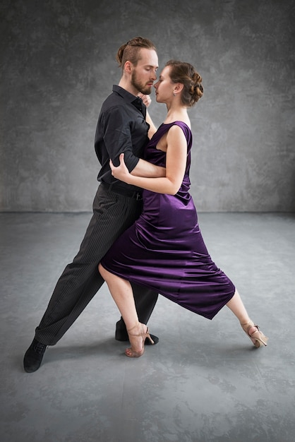 Free Photo beautiful elegant people dancing tango