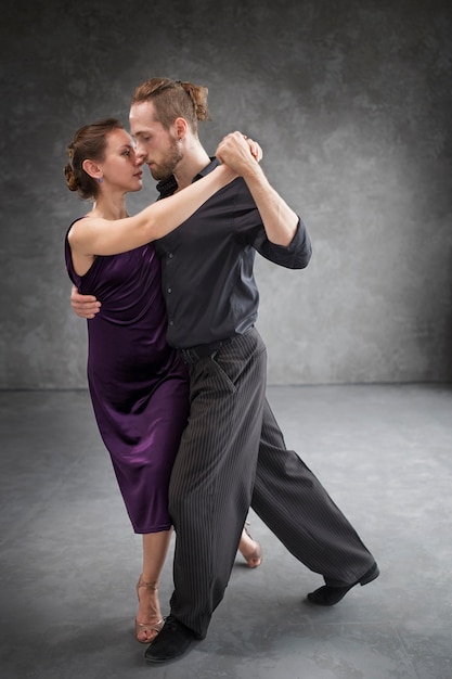 Beautiful elegant people dancing tango