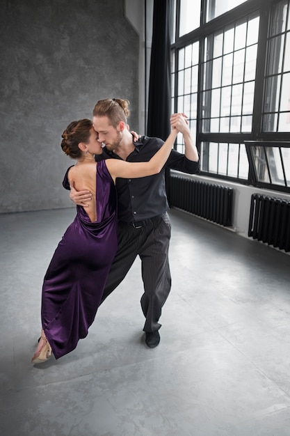 Free Photo beautiful elegant people dancing tango