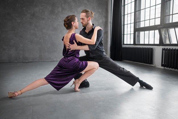 Beautiful elegant people dancing tango