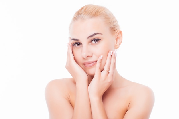 Beautiful face of young adult woman with clean fresh skin