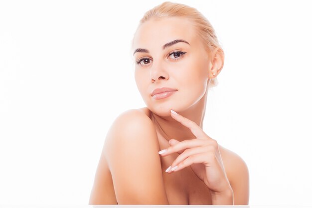 Beautiful face of young adult woman with clean fresh skin