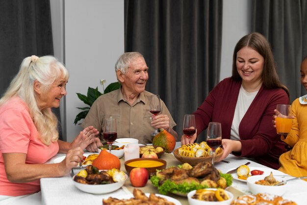 Beautiful family having a nice thanksgiving dinner together