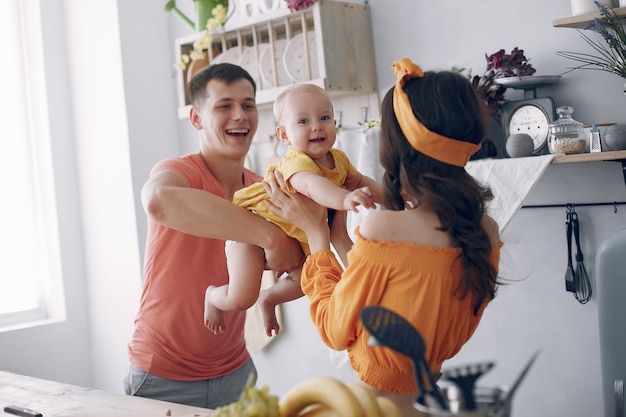 Beautiful family prepare food in a kitchen