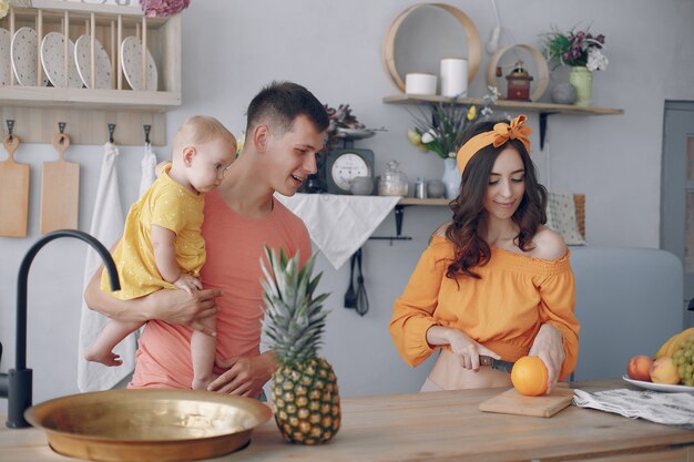 Beautiful family prepare food in a kitchen