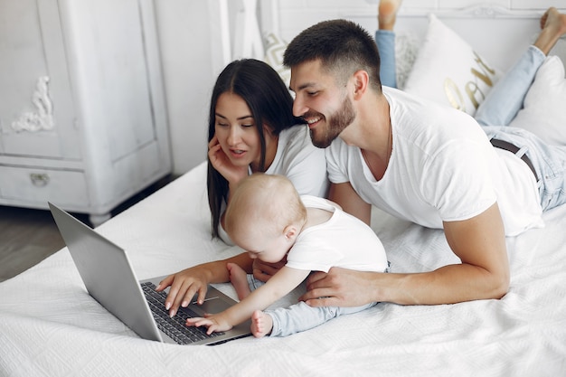 Beautiful family spend time in a bathroom